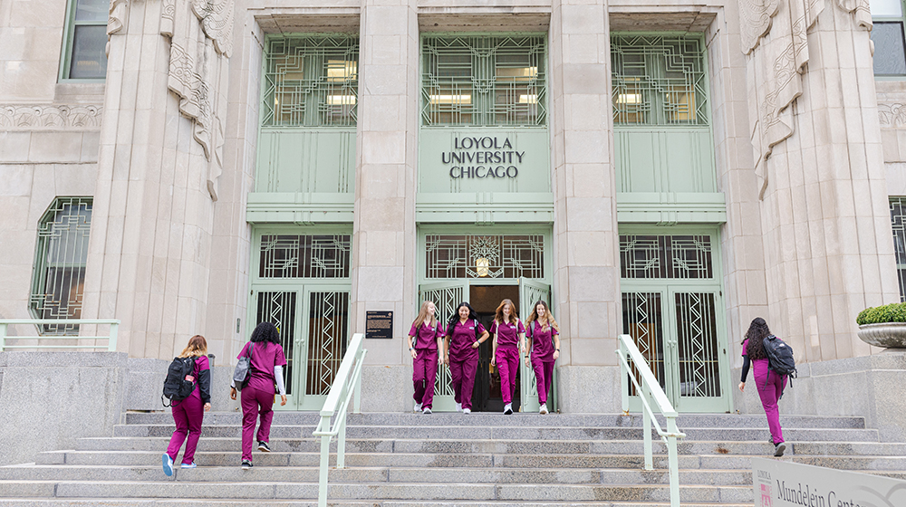 Loyola Nursing students enter Mundelein Hall.